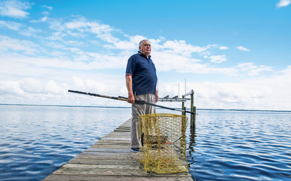 Rick Dove on the dock behind his house near the Neuse River.